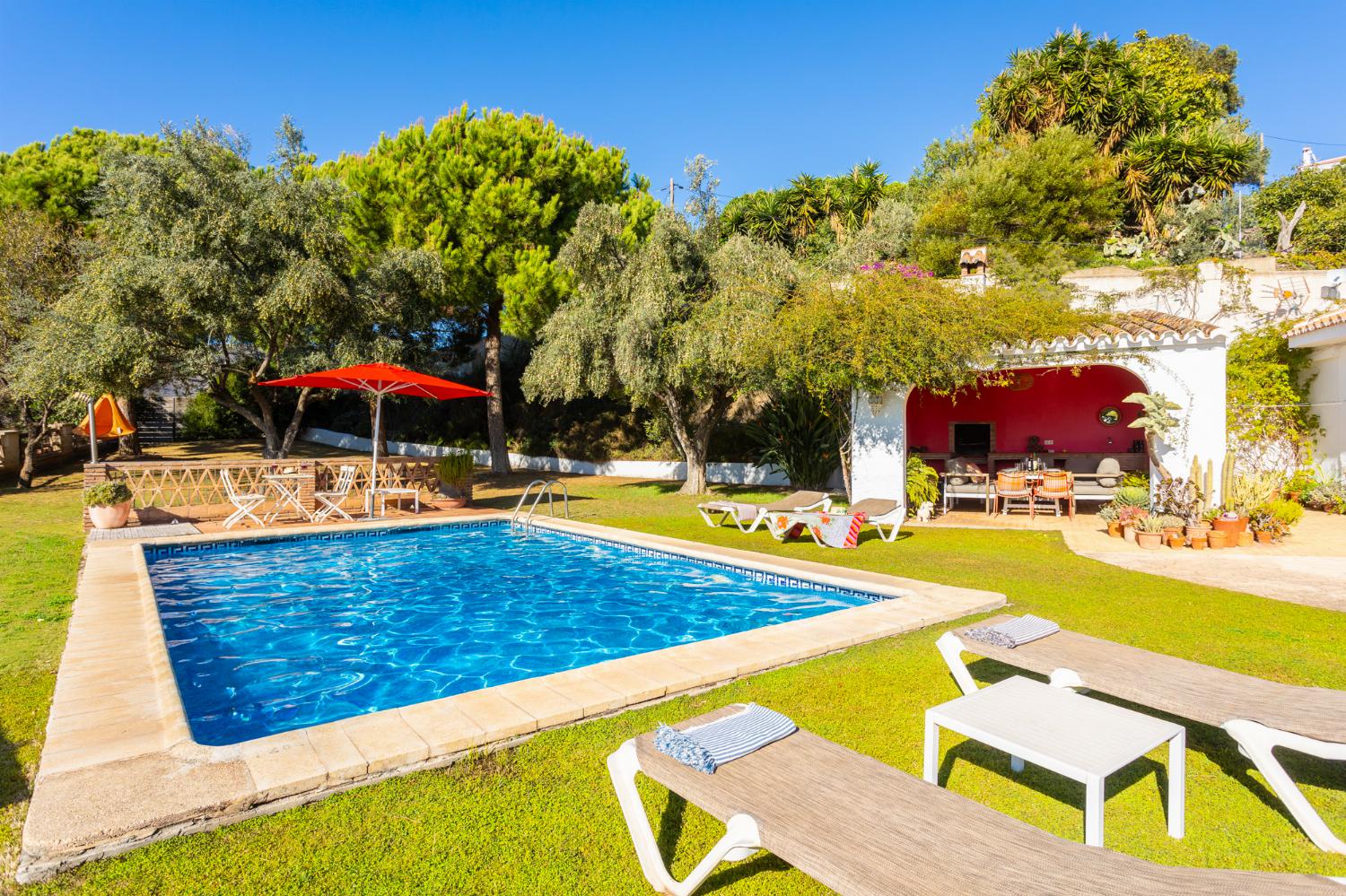 Private pool, terrace, and garden with sea views