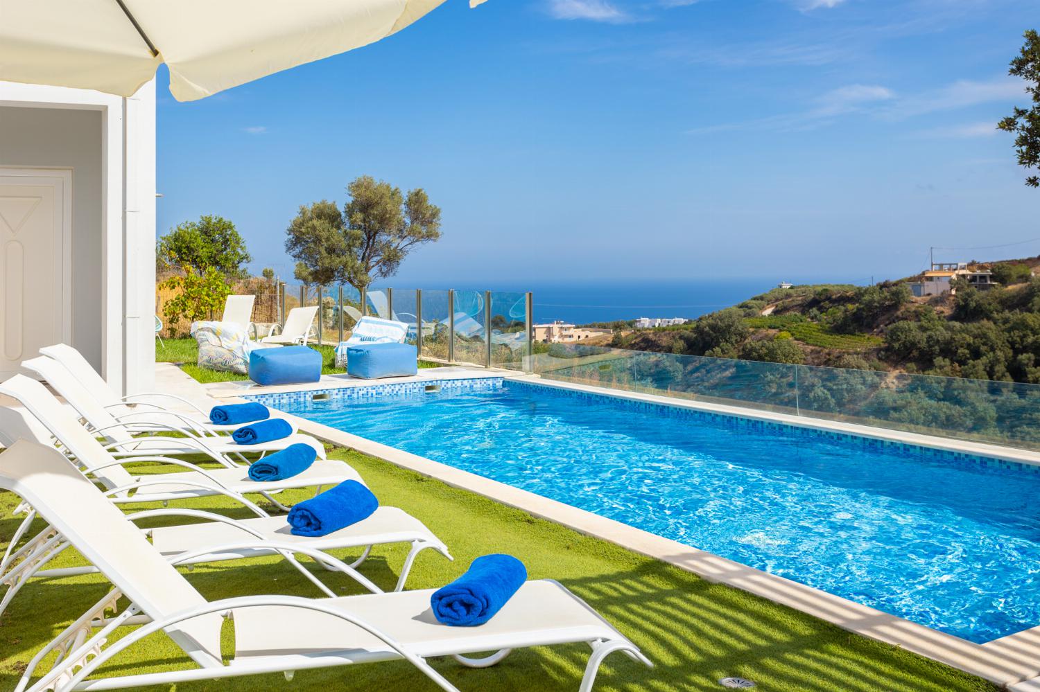 Private pool, terrace, and garden with sea views