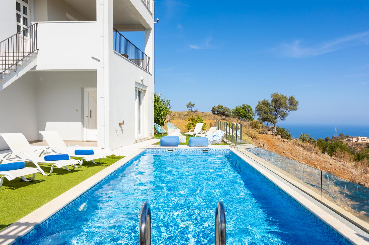 Private pool, terrace, and garden with sea views
