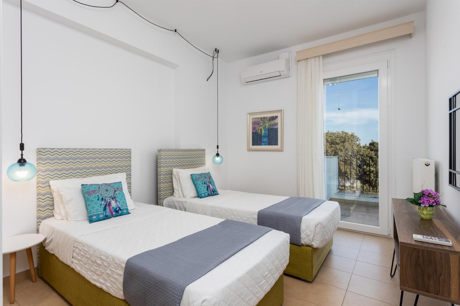Twin bedroom with A/C