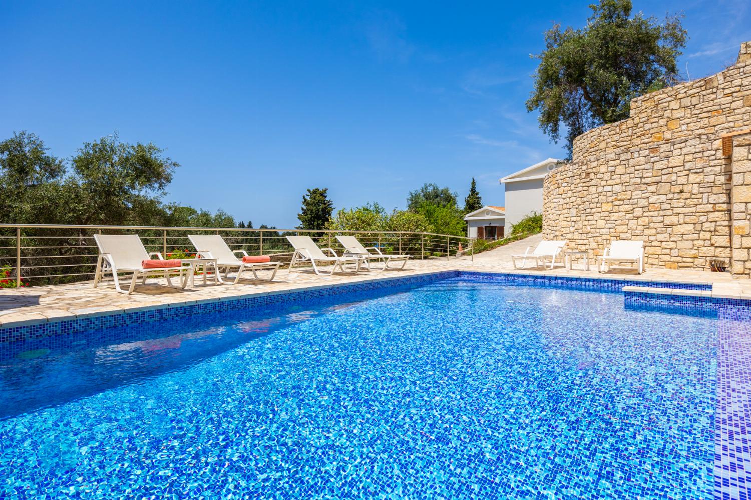 Beautiful villa with private pool, terraces, and garden with panoramic sea views