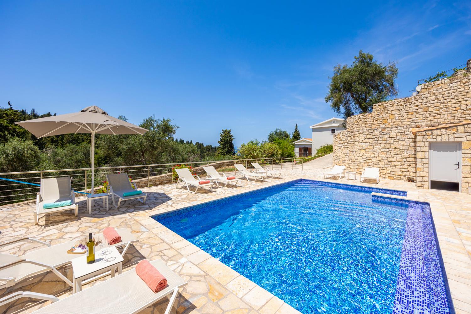 Beautiful villa with private pool, terraces, and garden with panoramic sea views