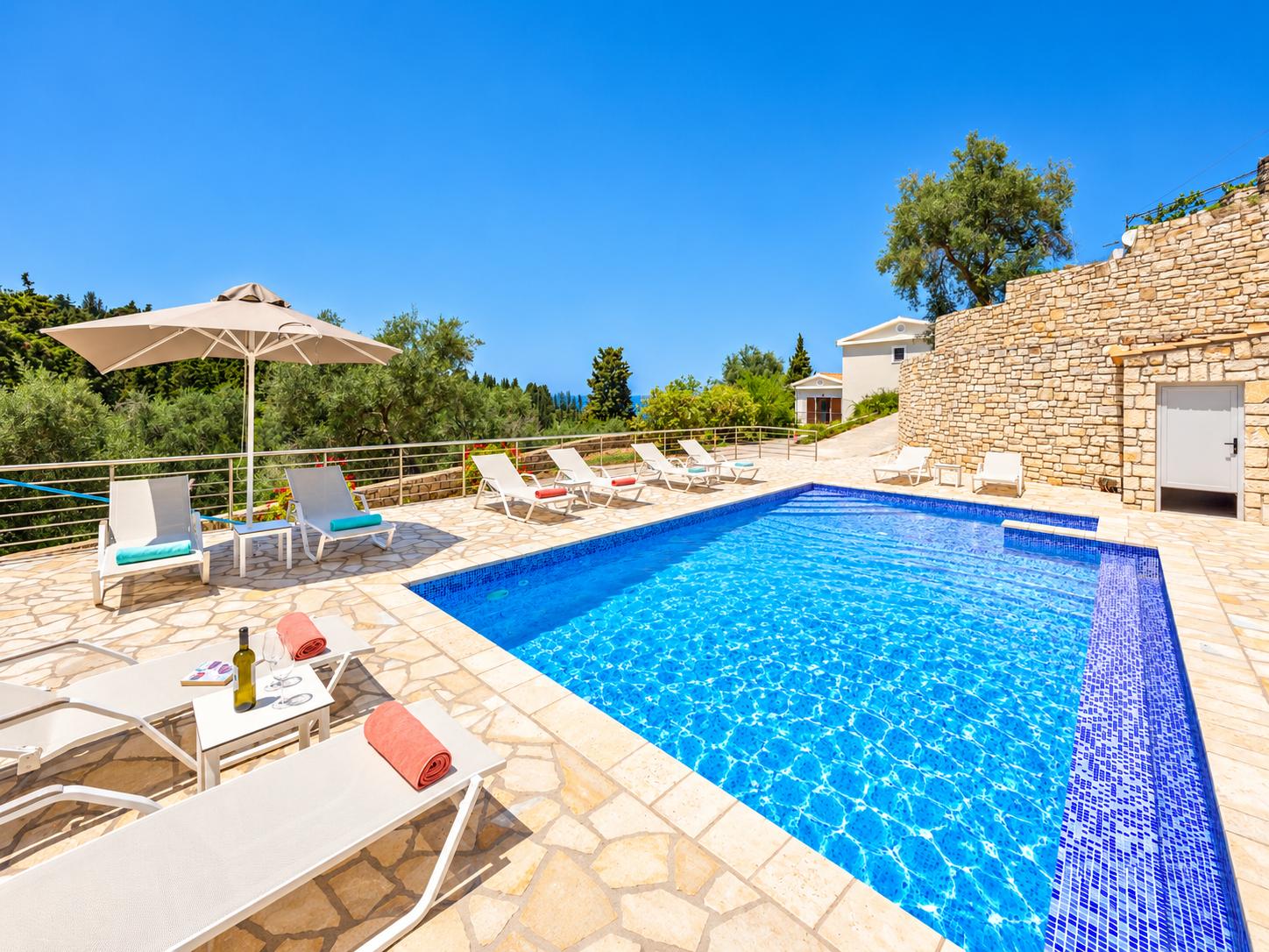 Beautiful villa with private pool, terraces, and garden with panoramic sea views