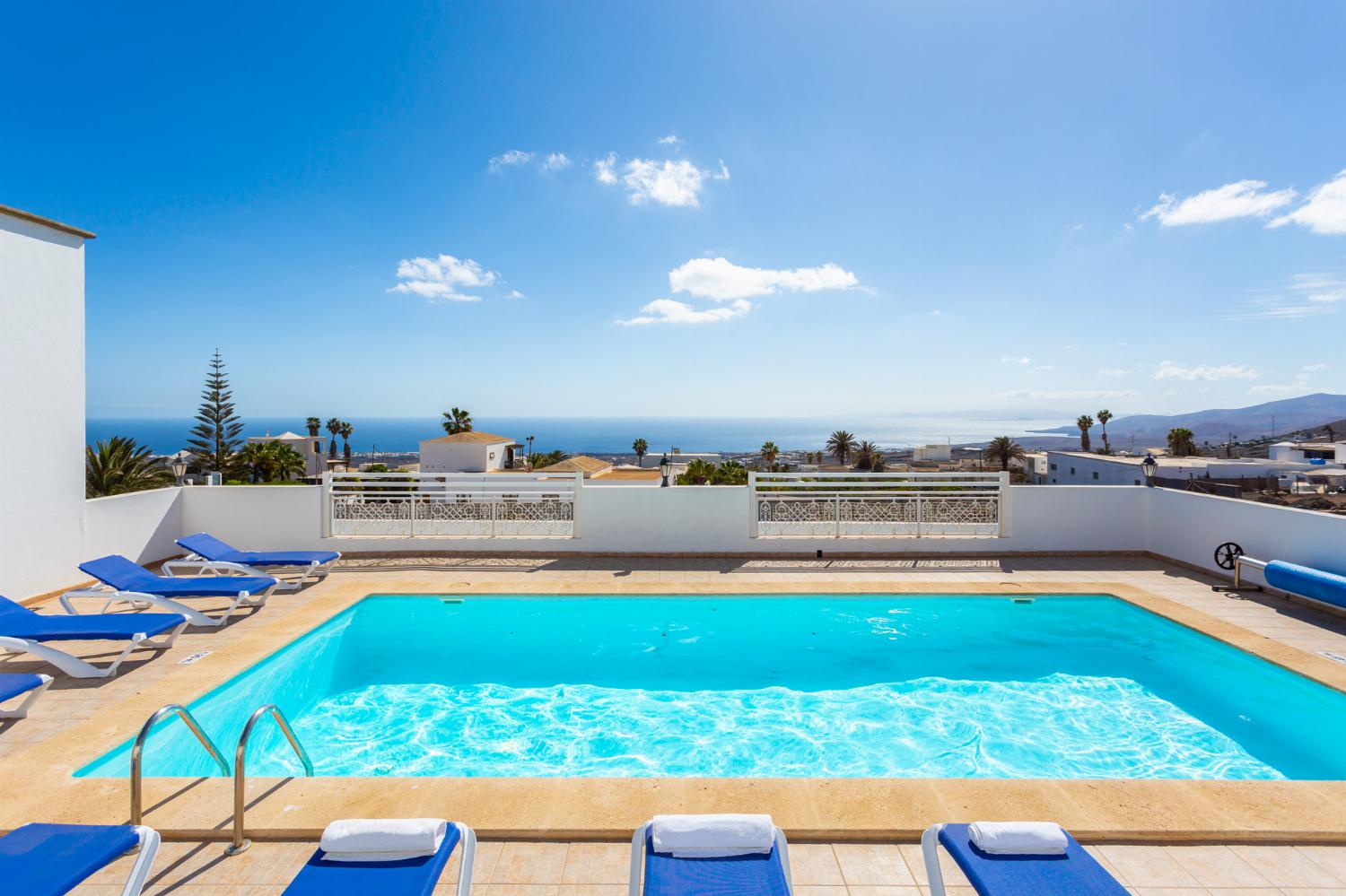 Private pool, terrace, and garden with sea views