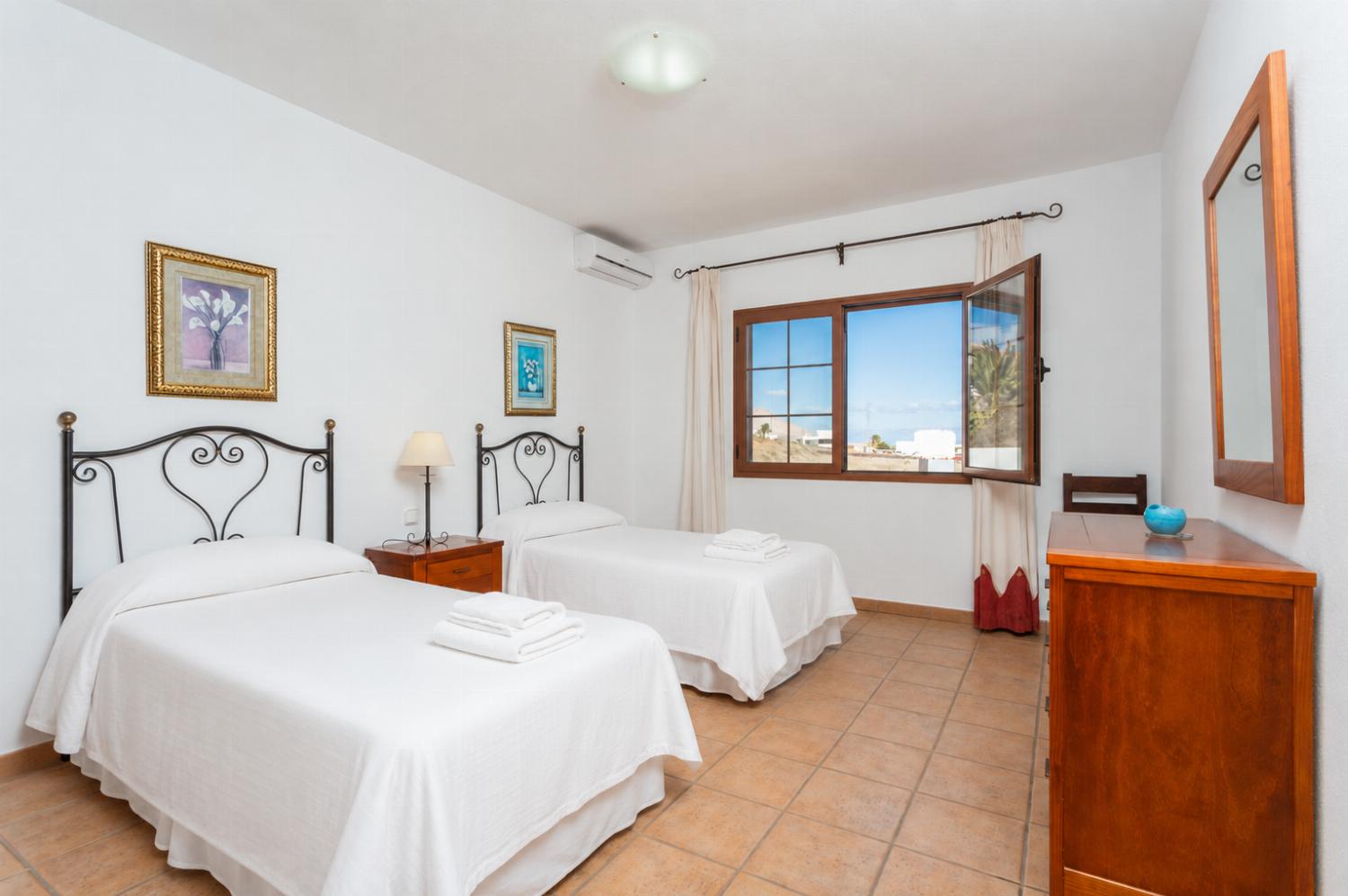 Twin bedroom with A/C