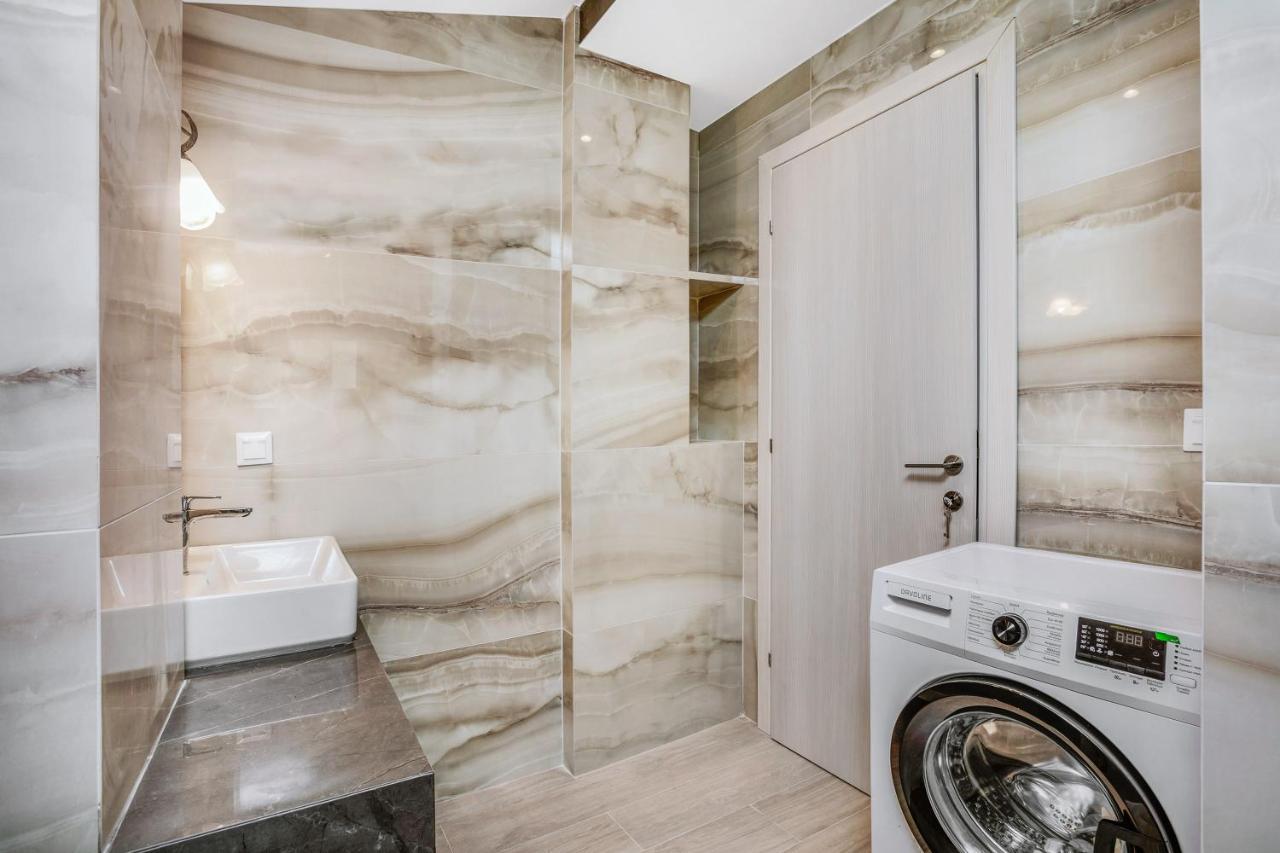 Family bathroom with shower and washing machine