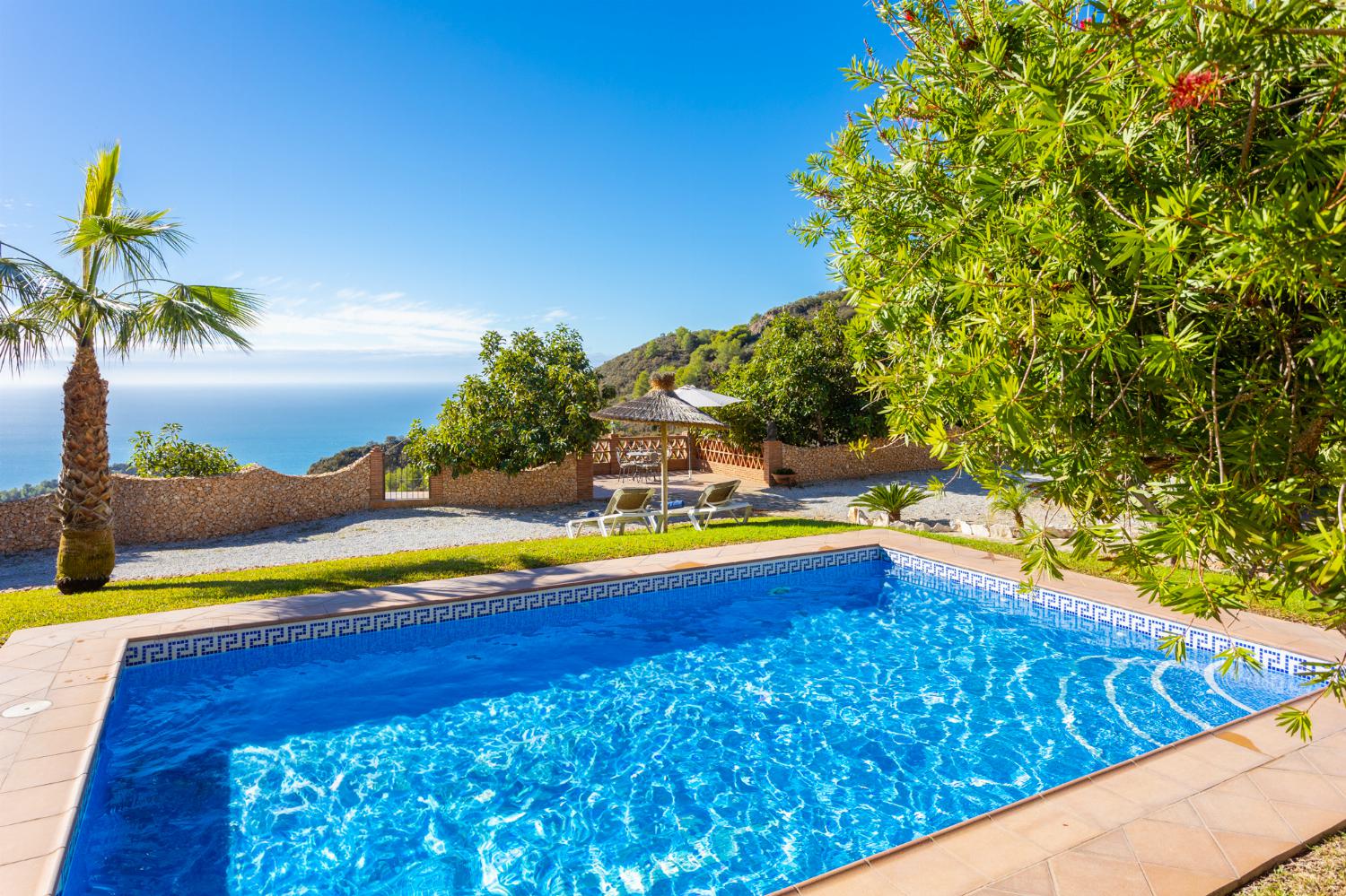 Private pool, terrace, and garden with sea views