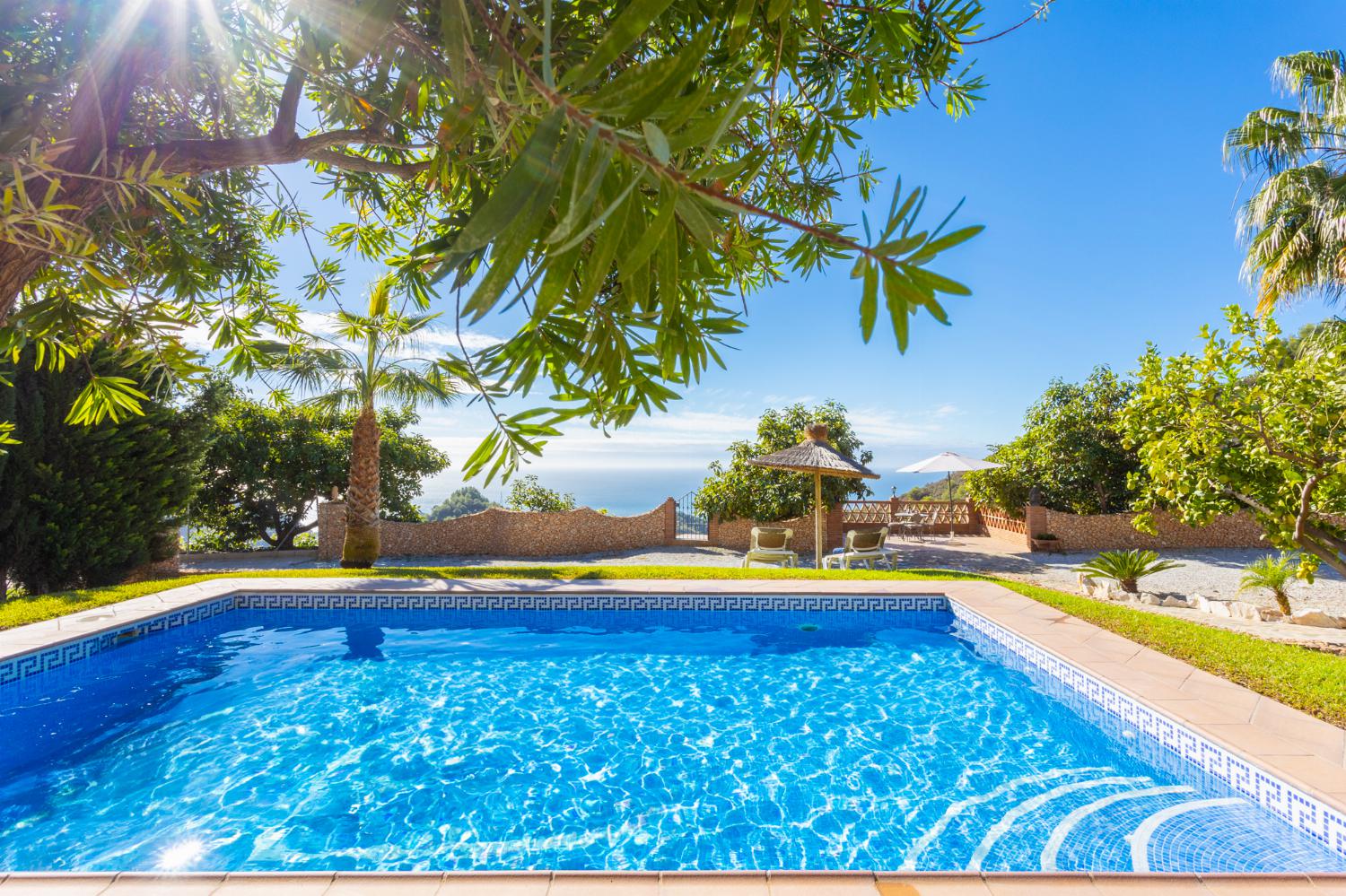 Private pool, terrace, and garden with sea views