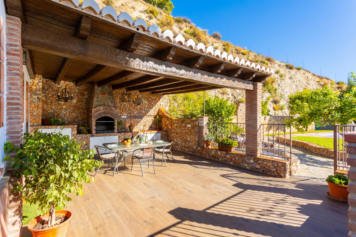 Sheltered terrace area with BBQ