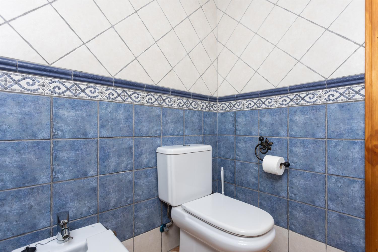 Family bathroom with bath and shower