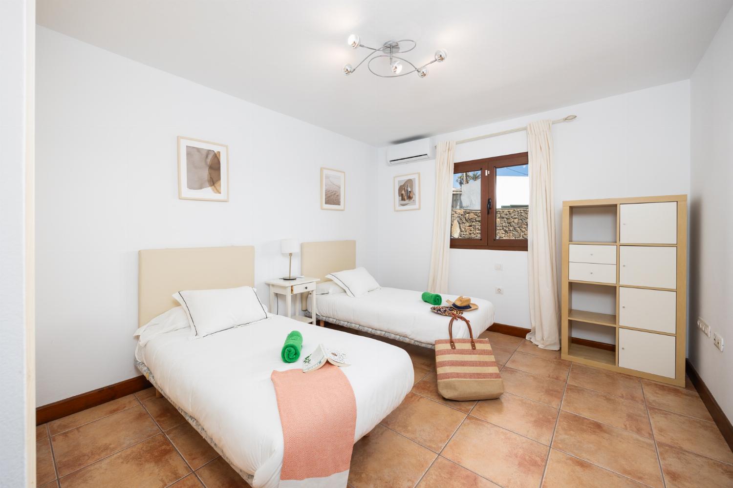 Twin bedroom with A/C