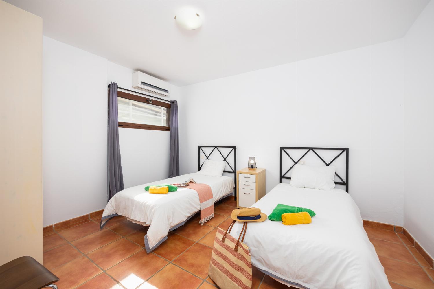 Twin bedroom with A/C
