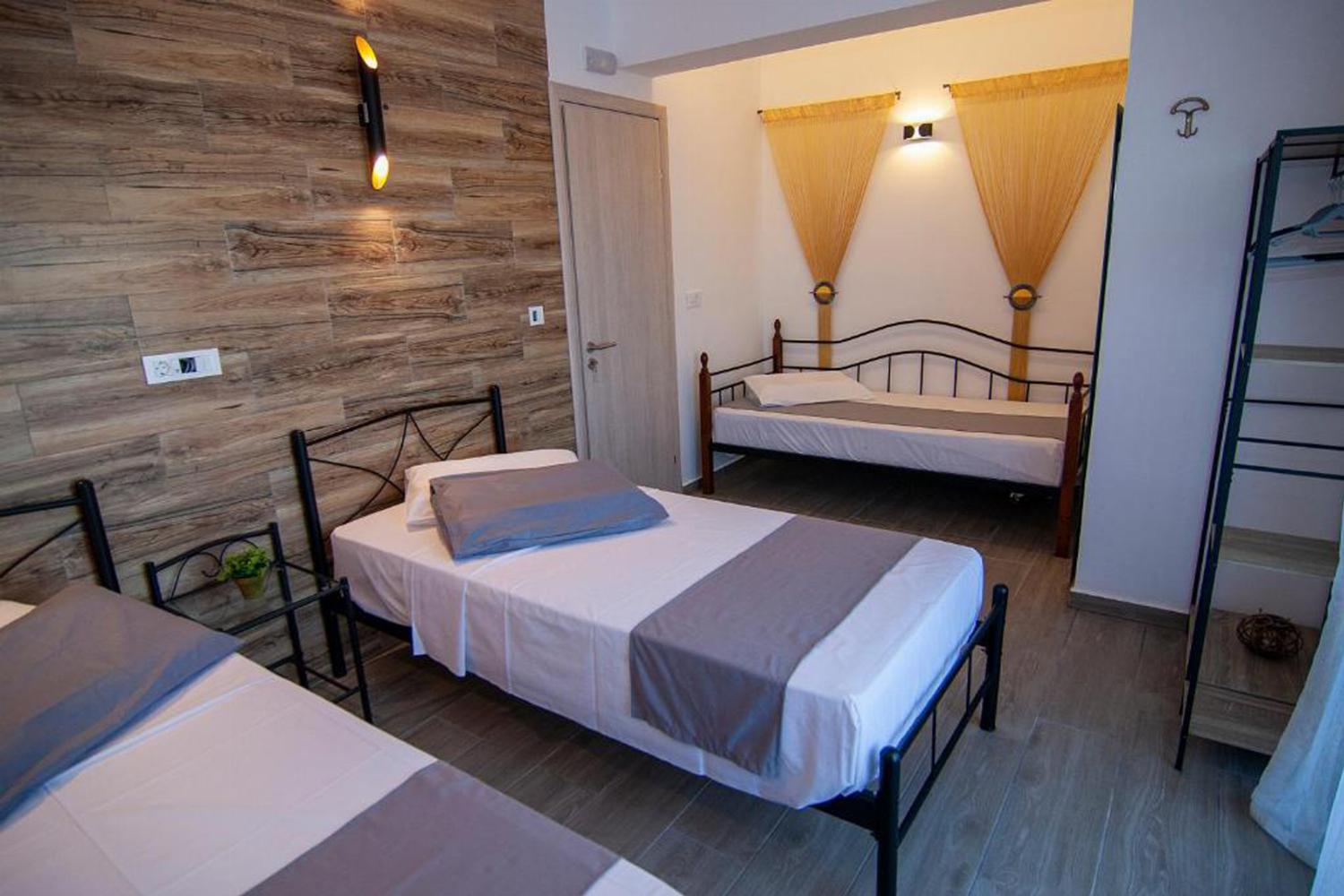Bedroom with three single beds
