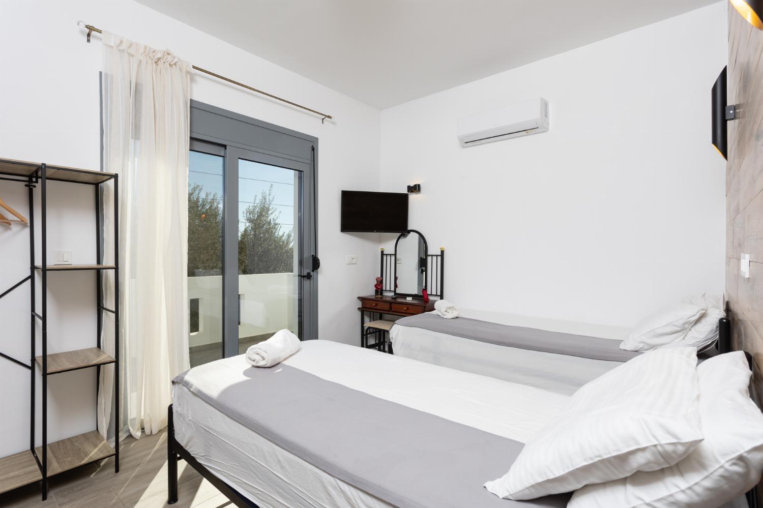 Twin bedroom with A/C