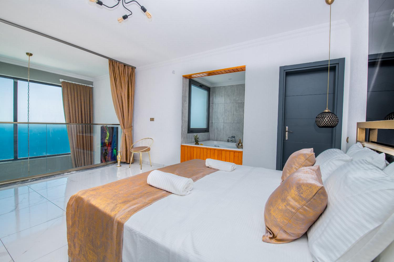 Double bedroom with en suite bathroom, A/C, with panoramic sea views