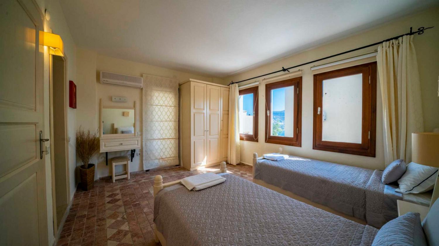 Twin bedroom with en suite bathroom with A/C