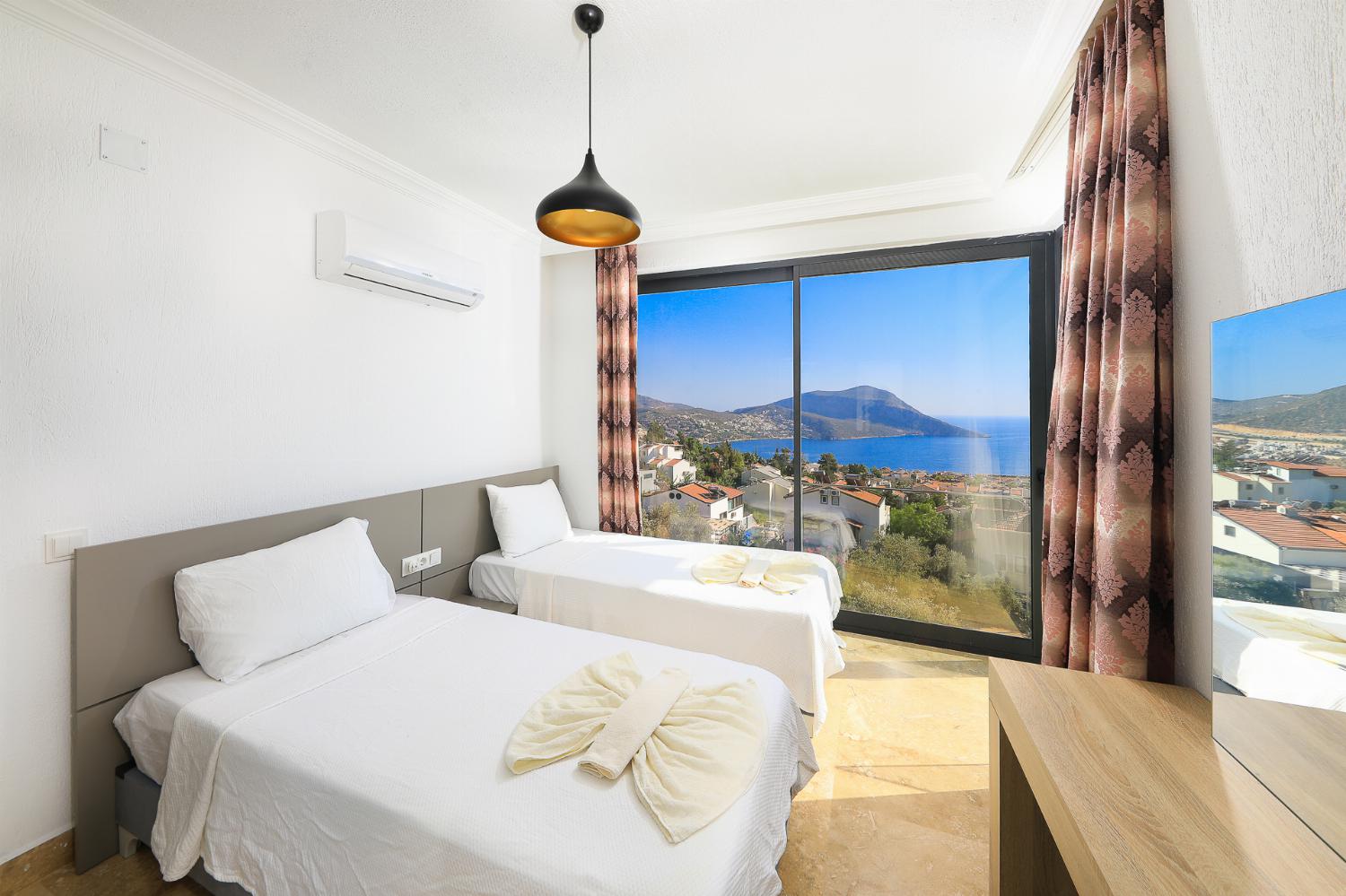 Twin bedroom with panoramic sea view