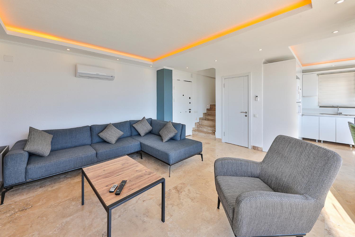 Open-plan living room with sofas