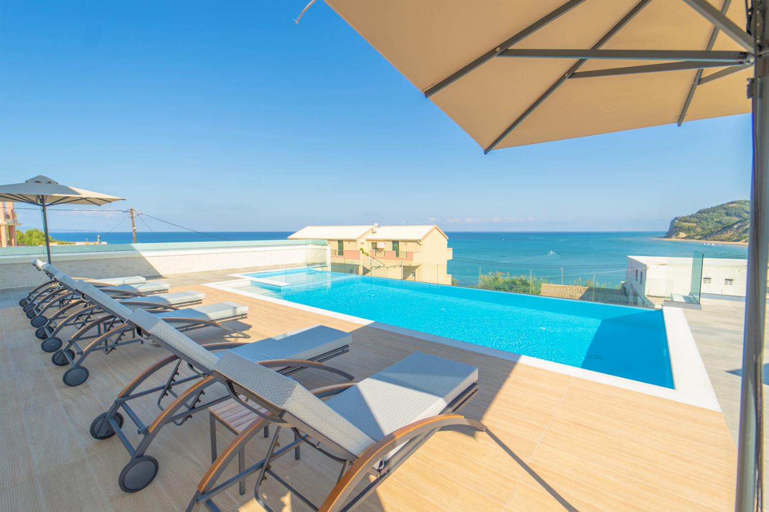 Private infinity pool and terrace with panoramic sea views
