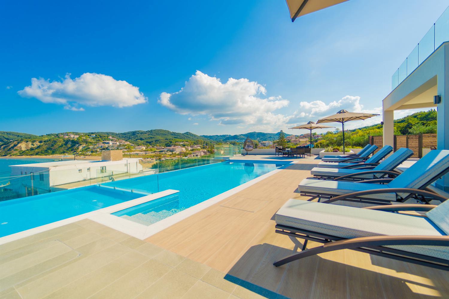 Private infinity pool and terrace with panoramic sea views