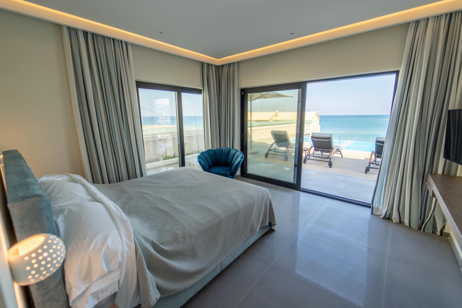 Double bedroom with A/C and upper terrace access with panoramic sea views