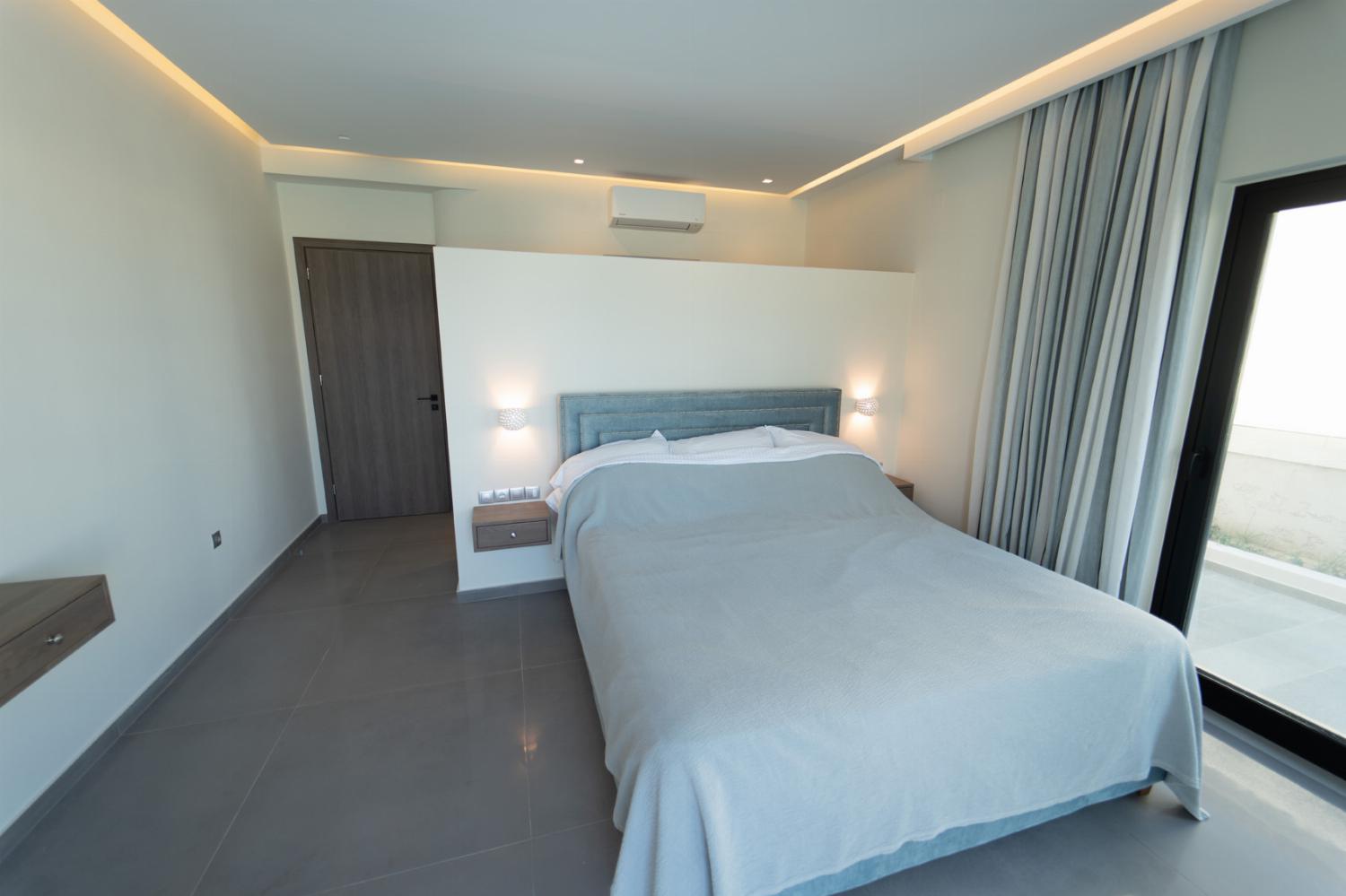 Double bedroom with A/C and upper terrace access with panoramic sea views