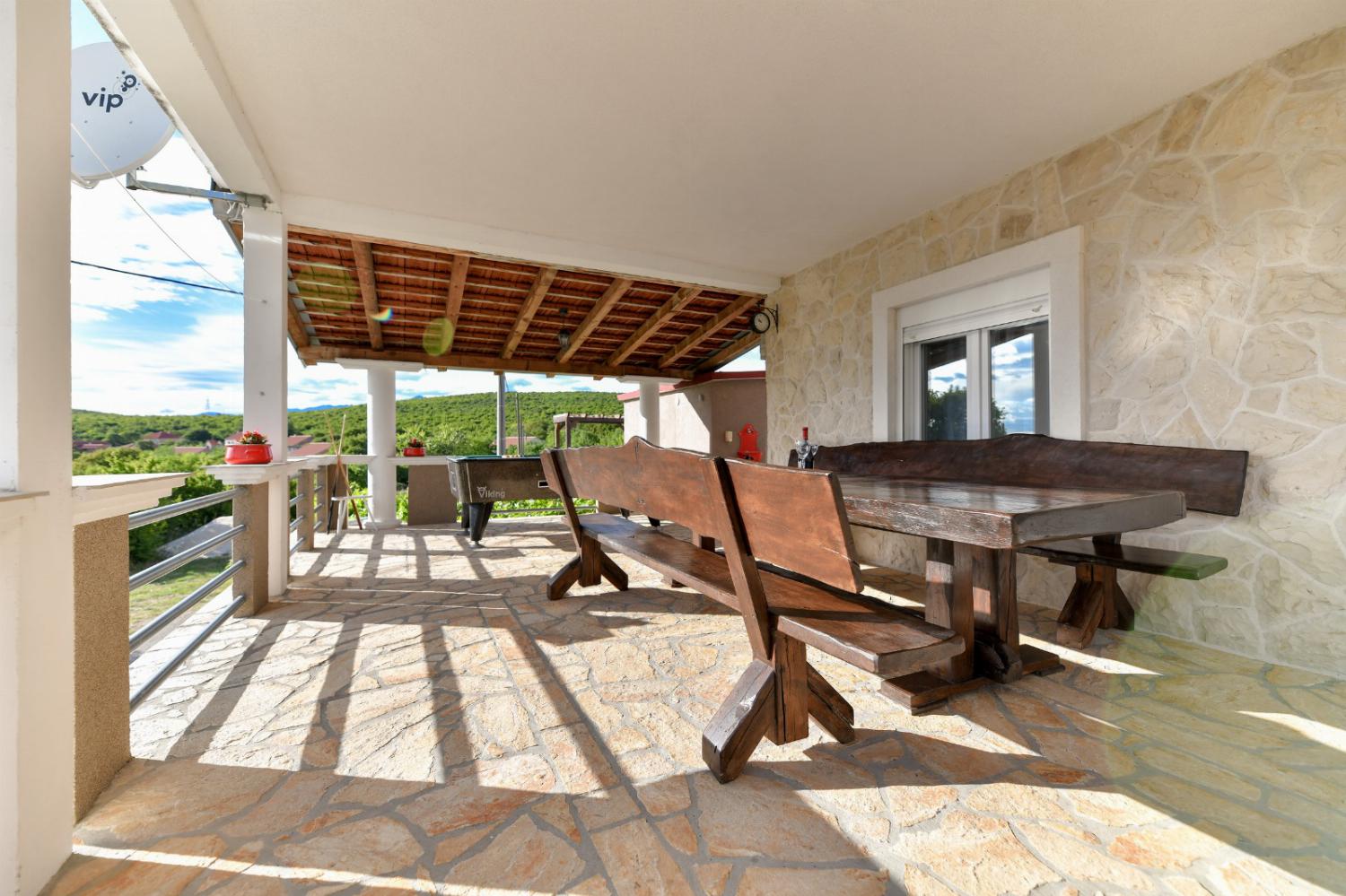 Sheltered terrace area with panoramic sea views