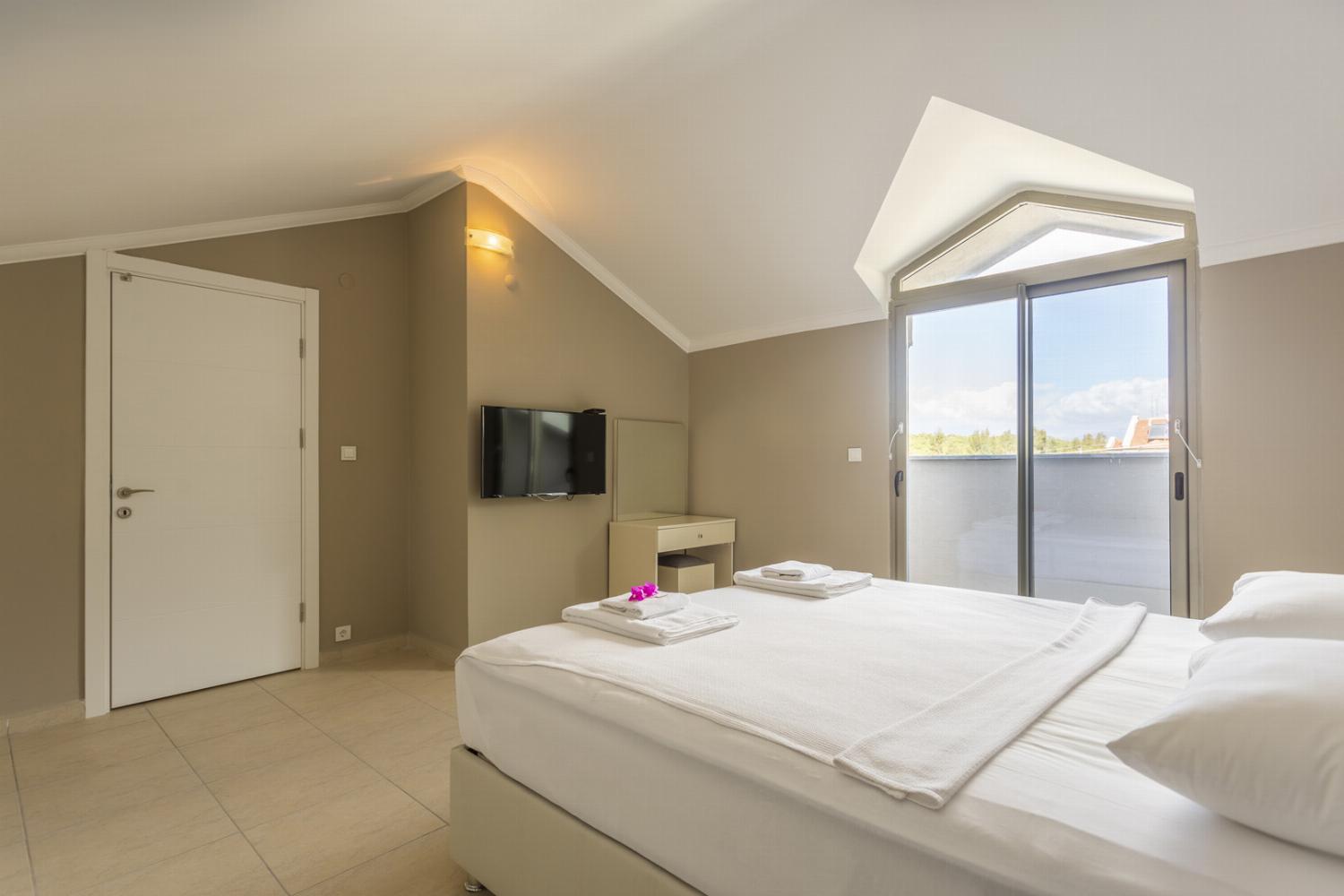 Double bedroom with en suite bathroom  tv and upper terrace access
