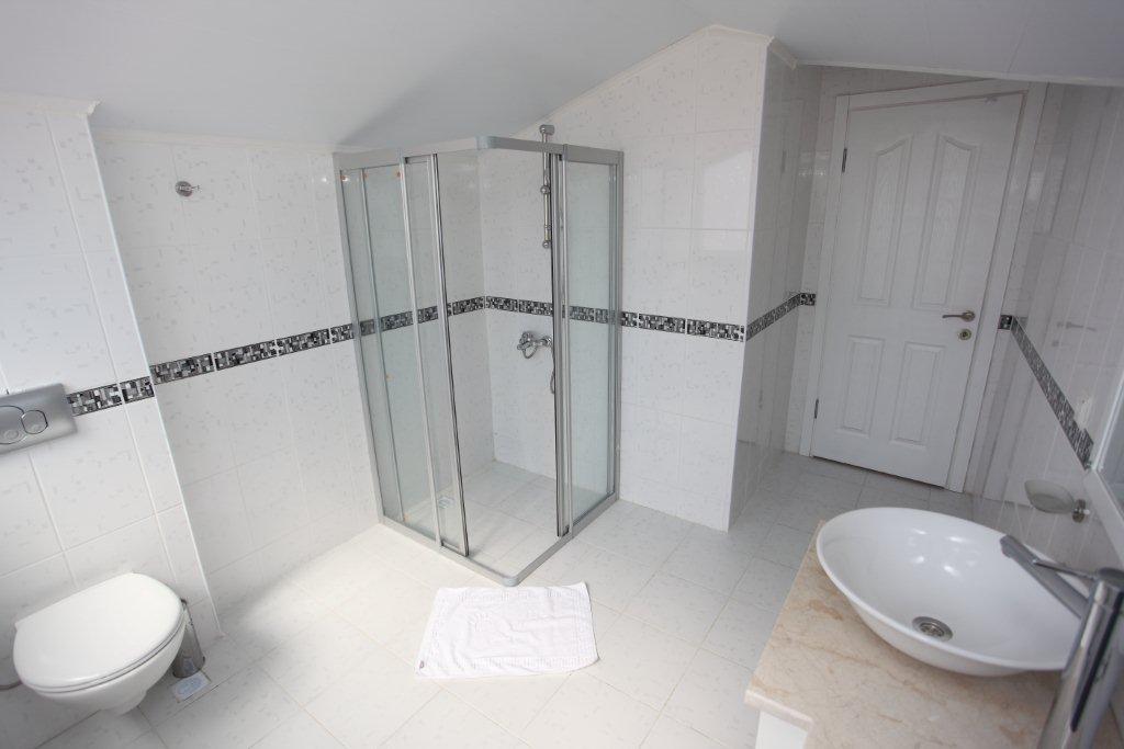En suite bathroom with shower