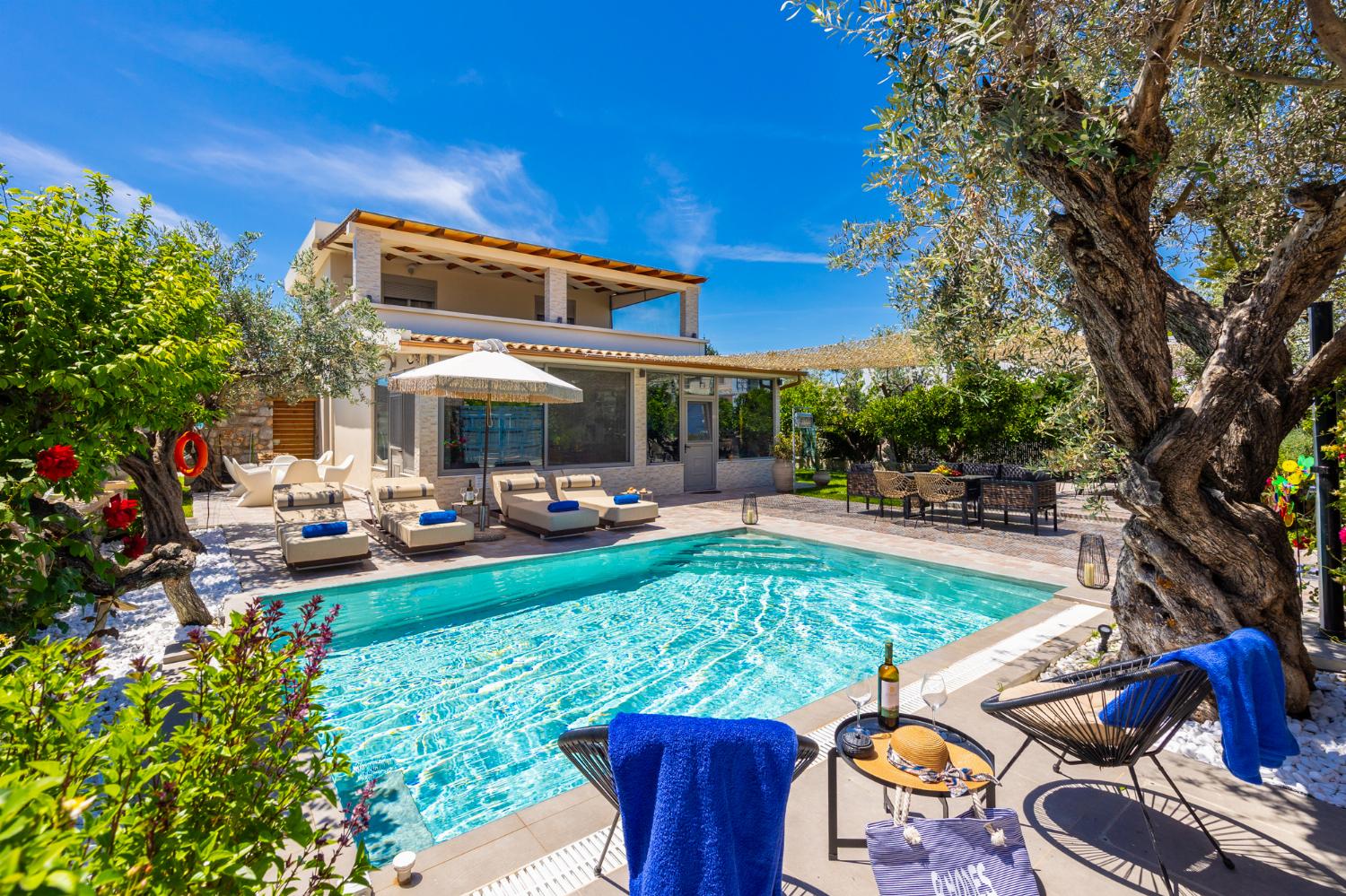,Beautiful villa with private pool, terrace, and garden