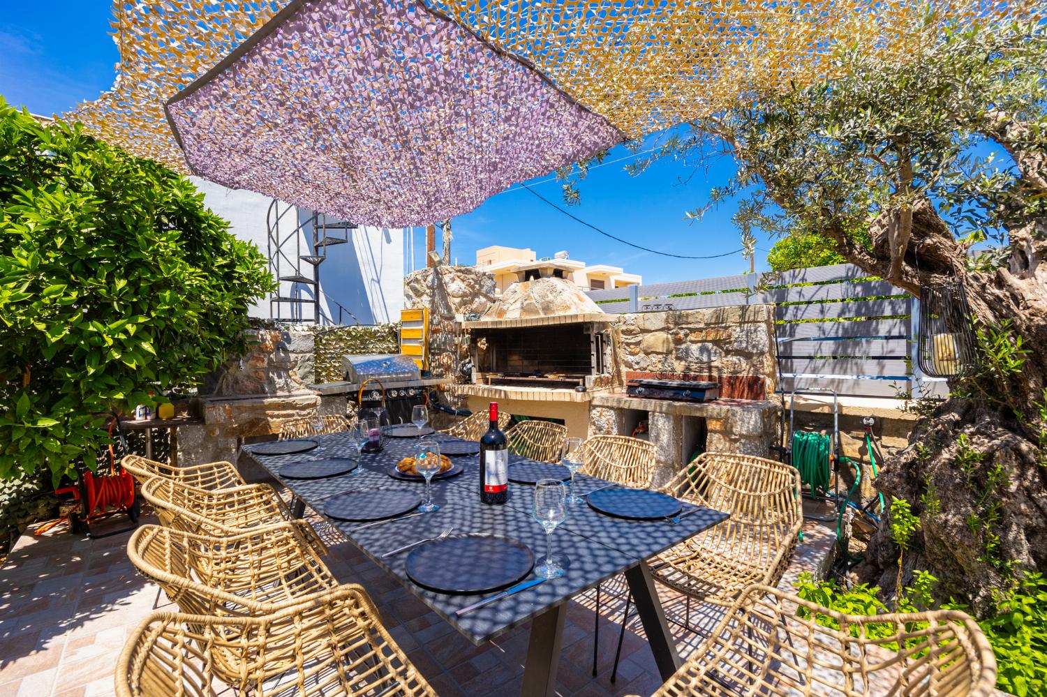 Sheltered terrace area with BBQ