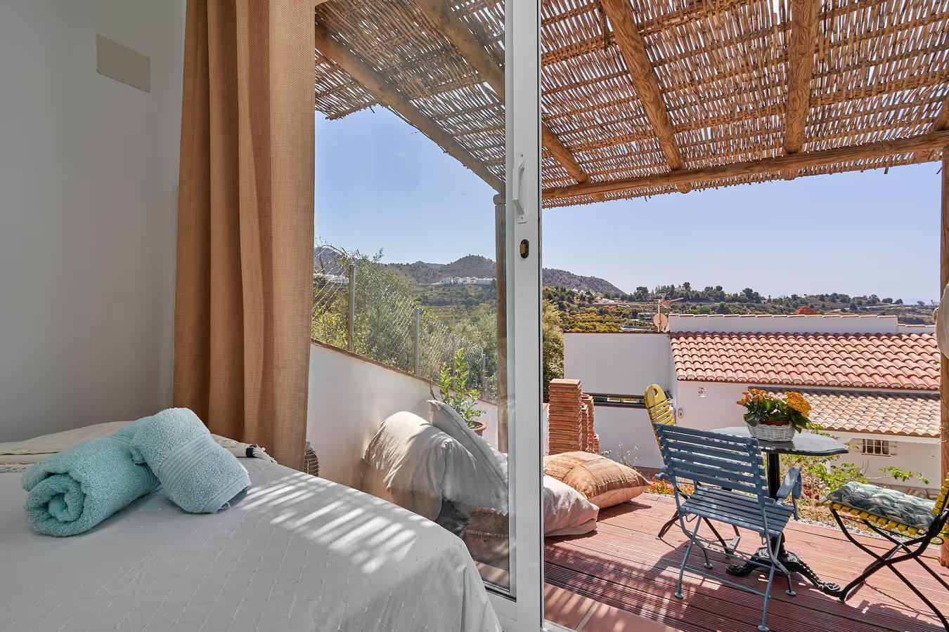 Double bedroom with A/C and terrace access with panoramic view