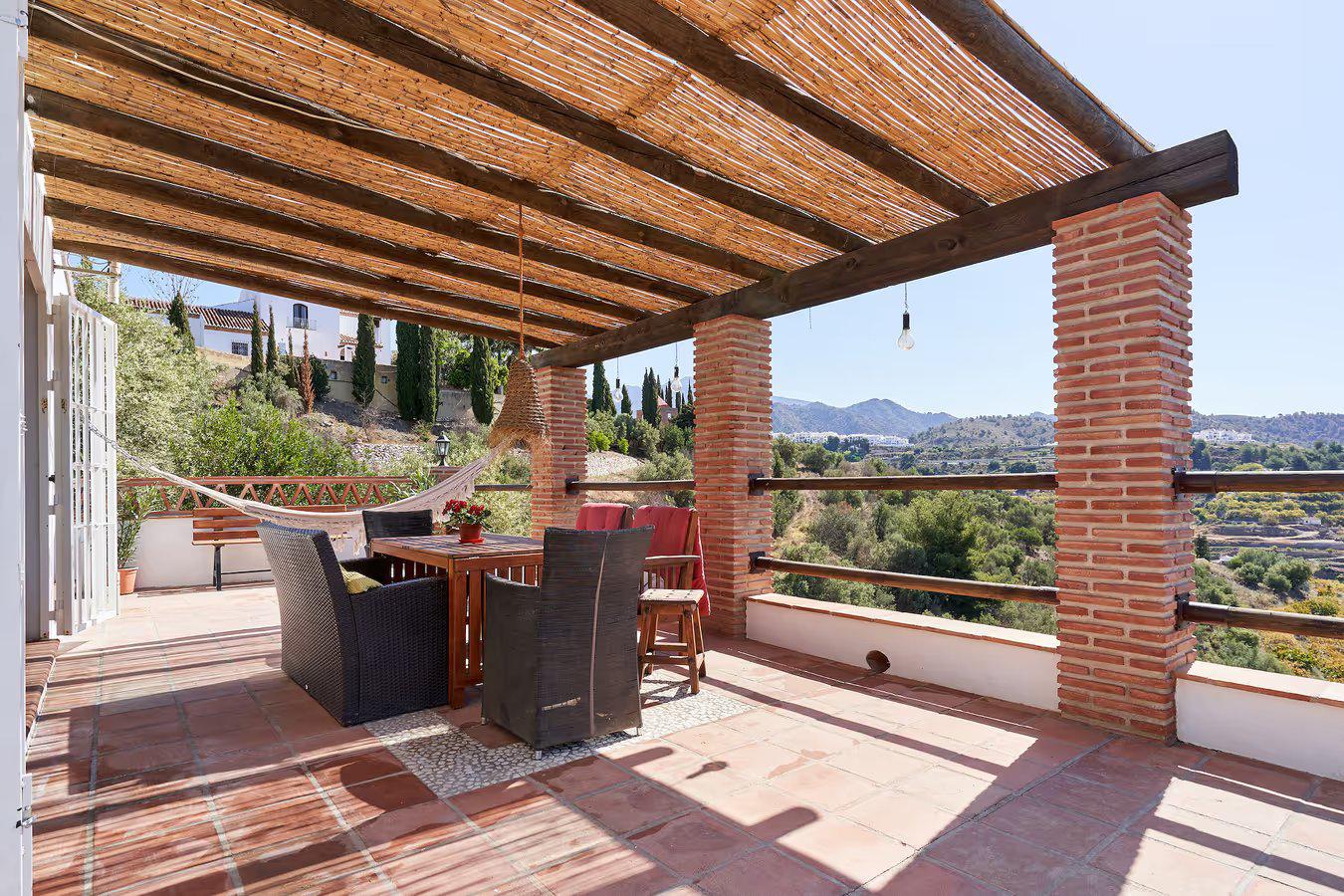Sheltered terrace with panoramic sea views