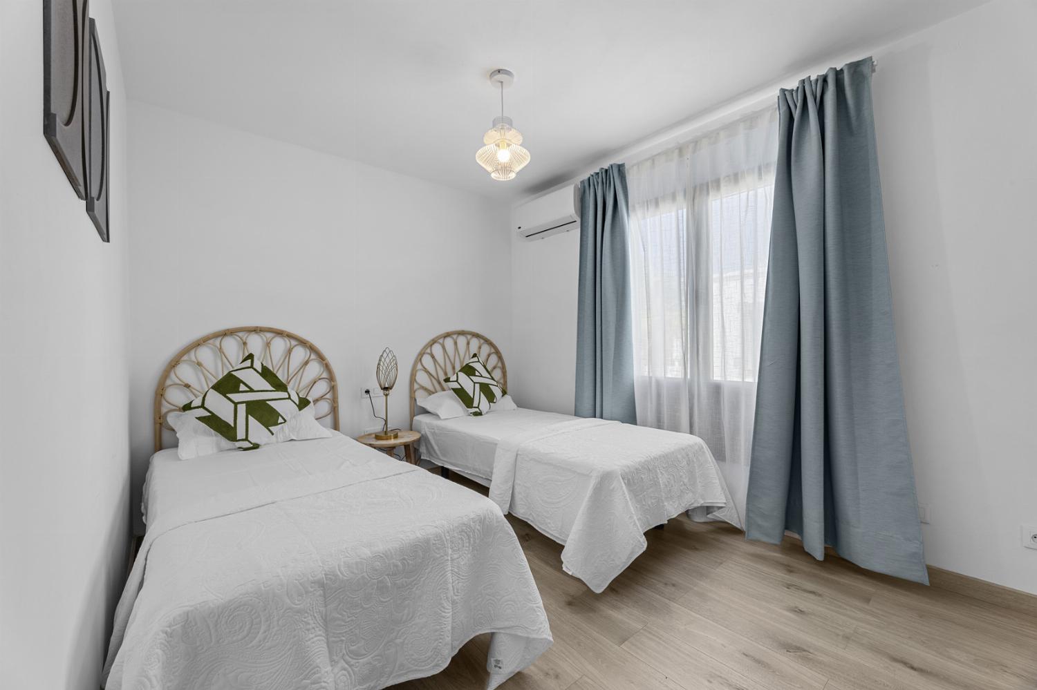Twin bedroom with A/C