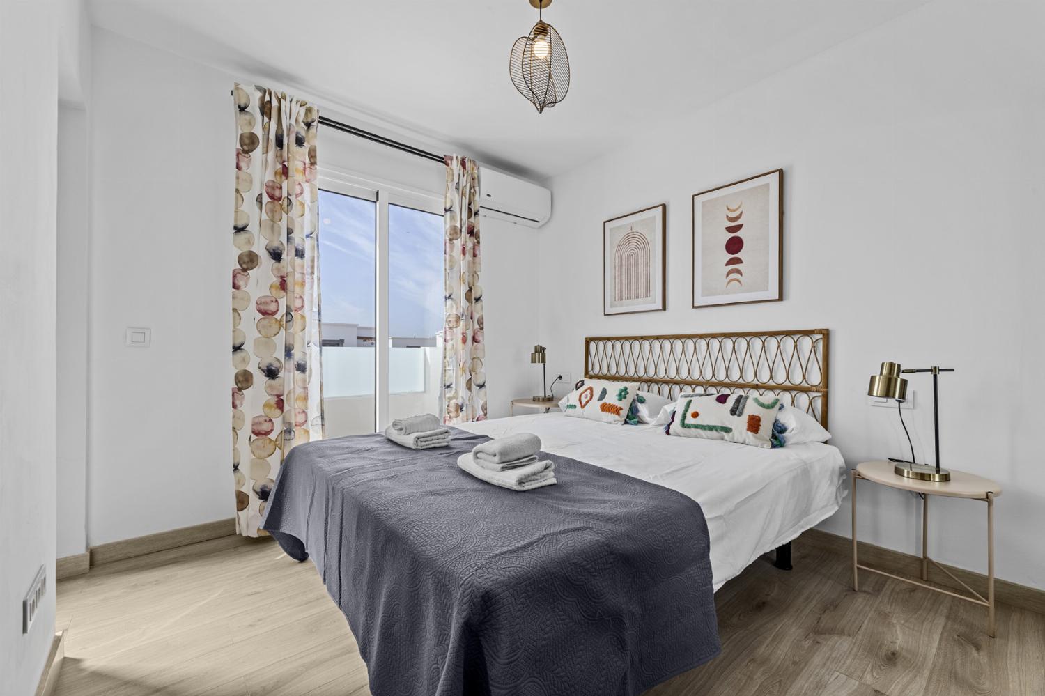 Double bedroom with A/C and en suite bathroom
