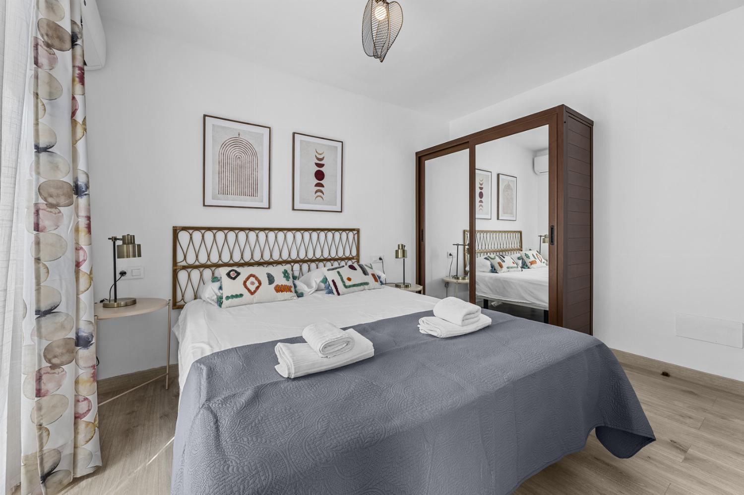 Double bedroom with A/C and en suite bathroom