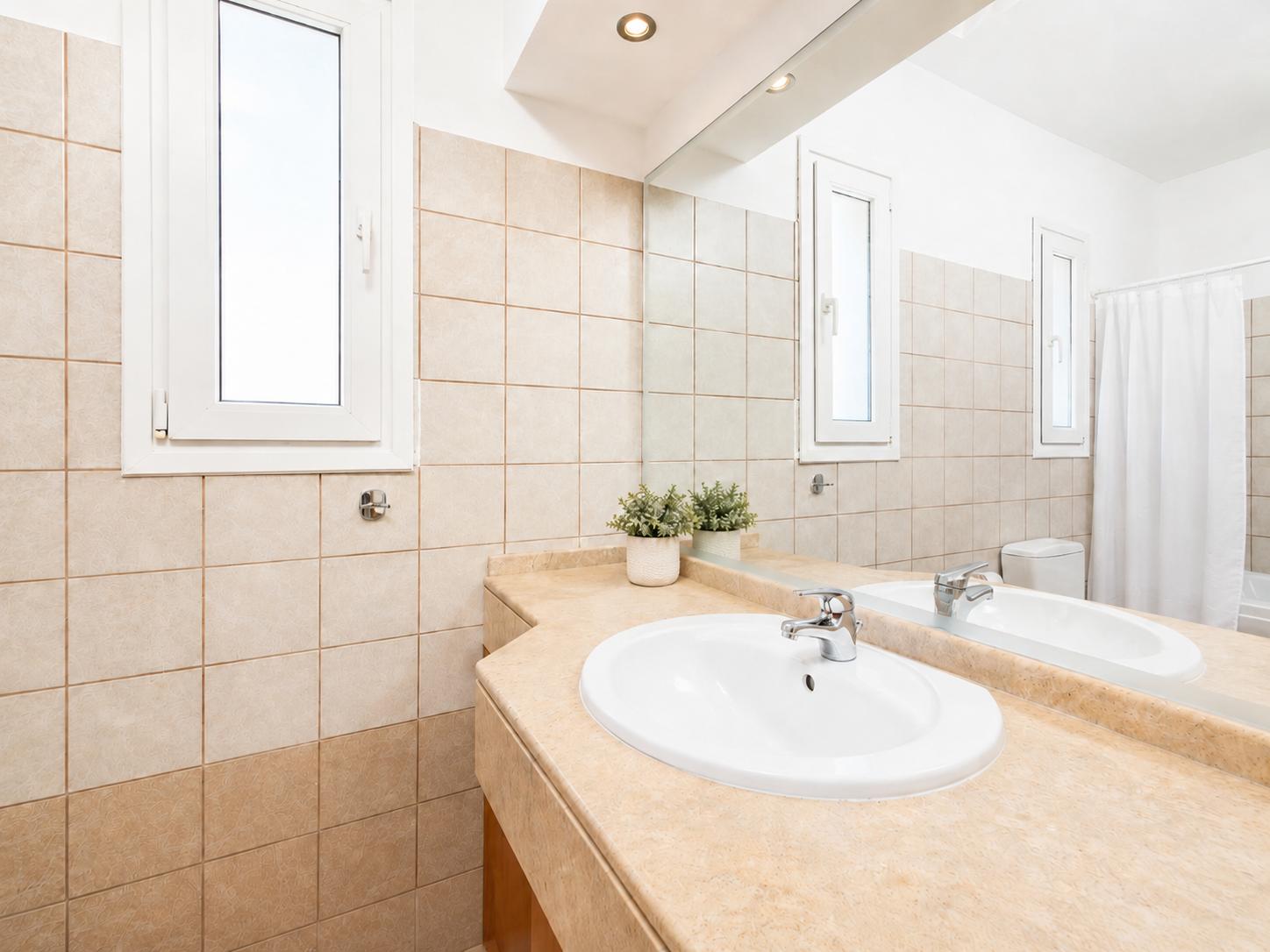 Family bathroom with bath and shower