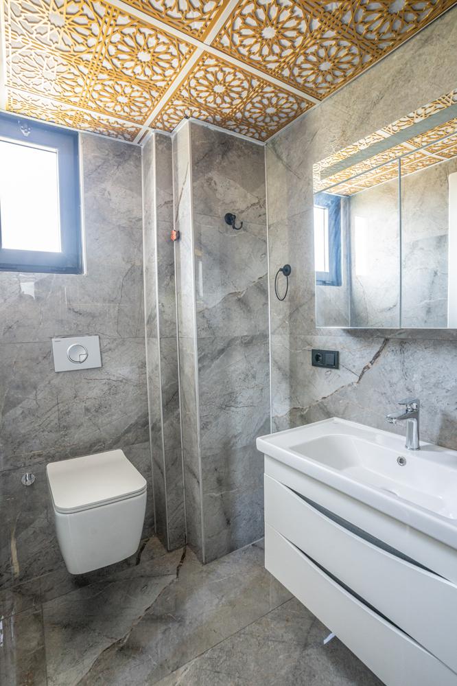 En suite bathroom with shower and WC