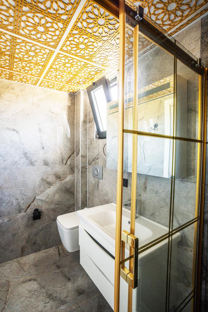 En suite bathroom with shower and WC
