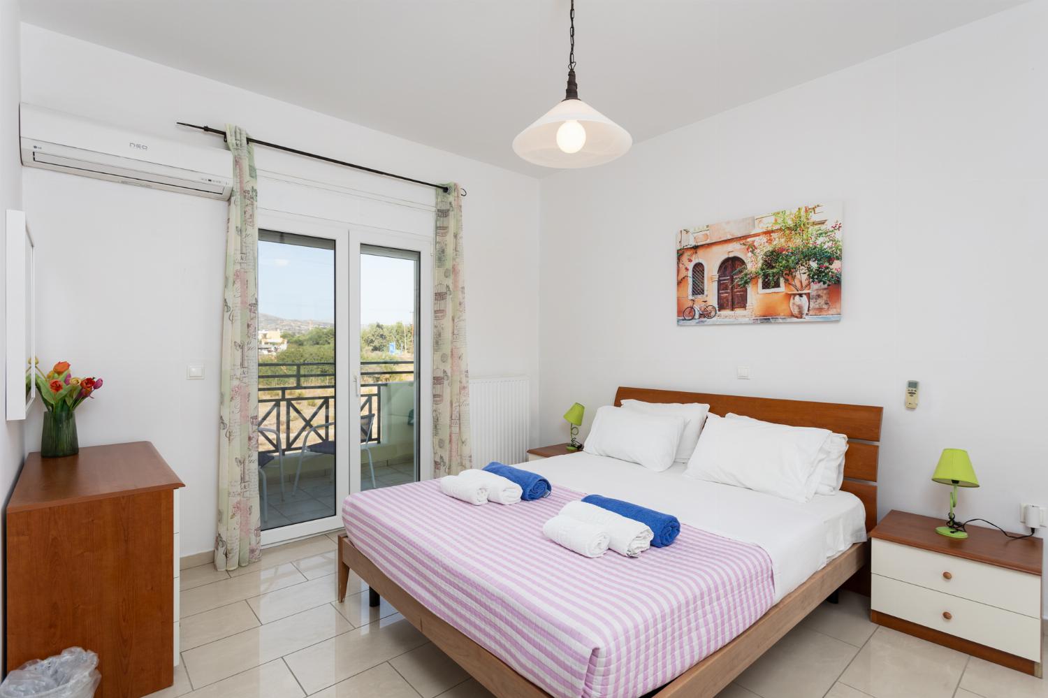 Double bedroom with A/C and balcony access