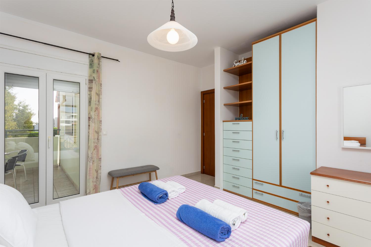 Double bedroom with A/C and balcony access