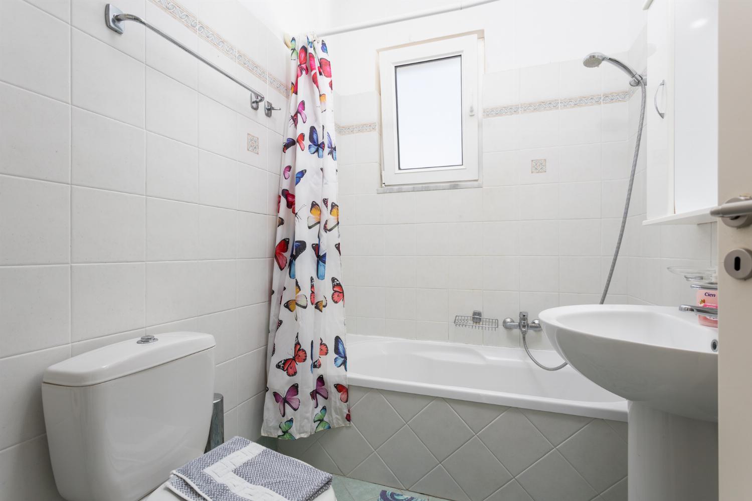 Family bathroom with bath