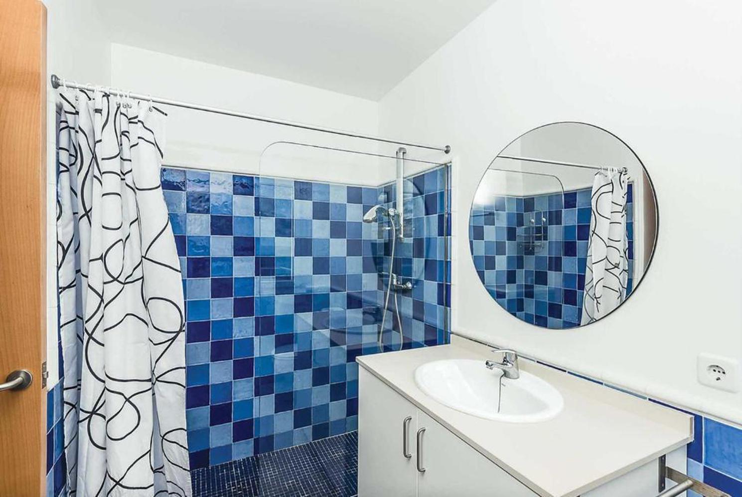 En suite bathroom with shower and WC