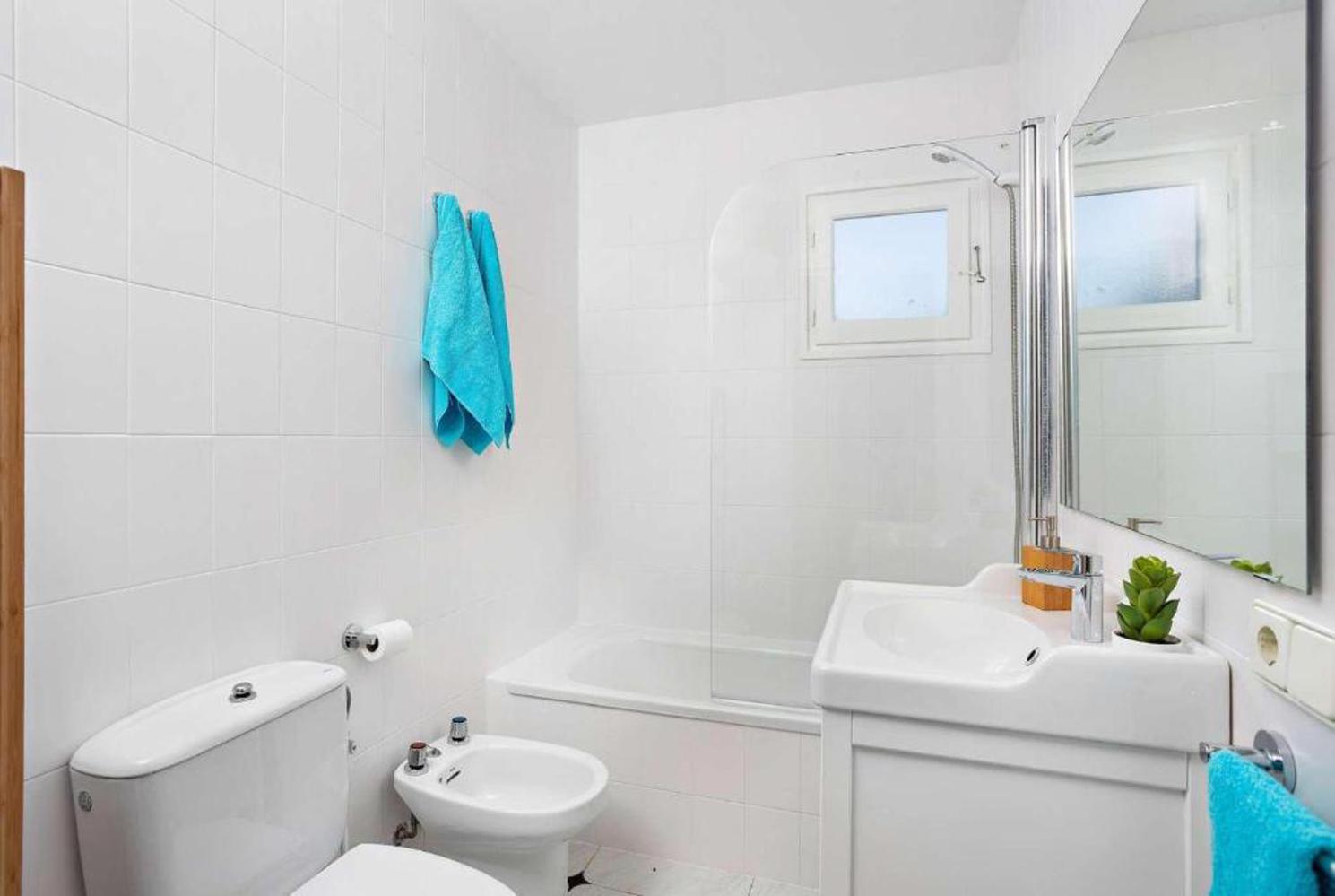 En suite bathroom with bath