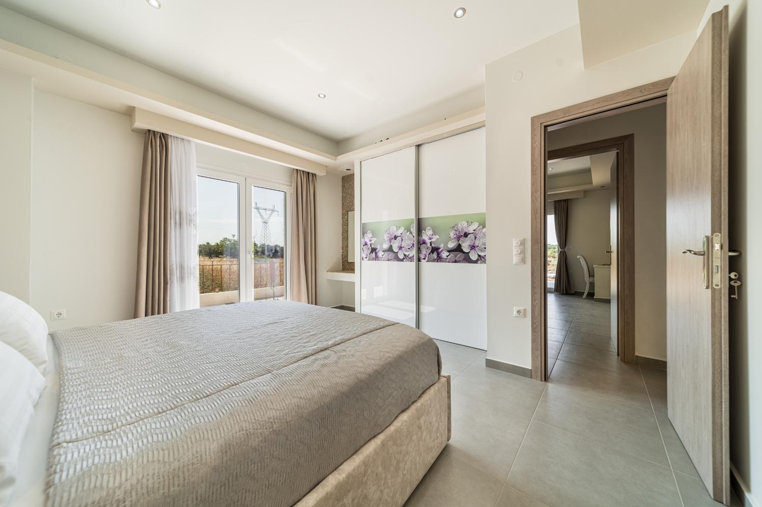Double bedroom with A/C , en suite bathroom and terrace access with panoramic views