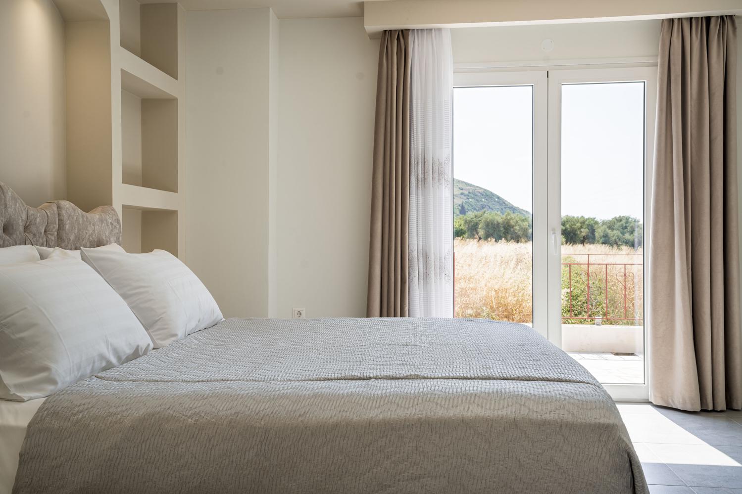 Double bedroom with A/C, en suite bathroom and terrace access with panoramic views