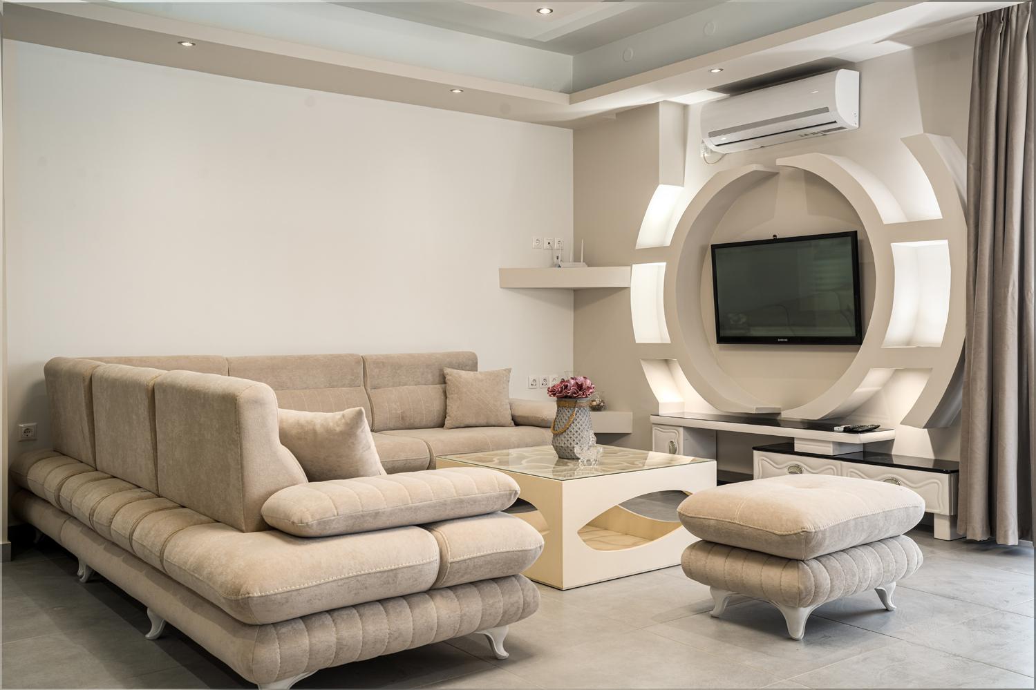 Open-plan living room with sofa, WiFi internet, satellite TV