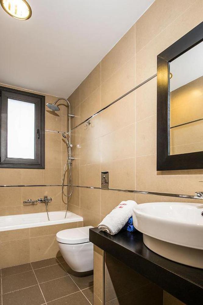En suite bathroom with shower and WC