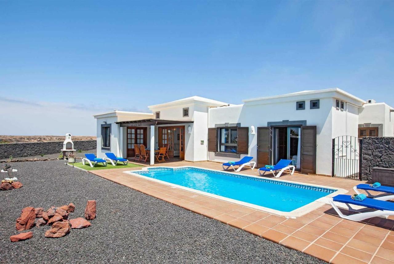 Outdoor area with sheltered terrace and BBQ
