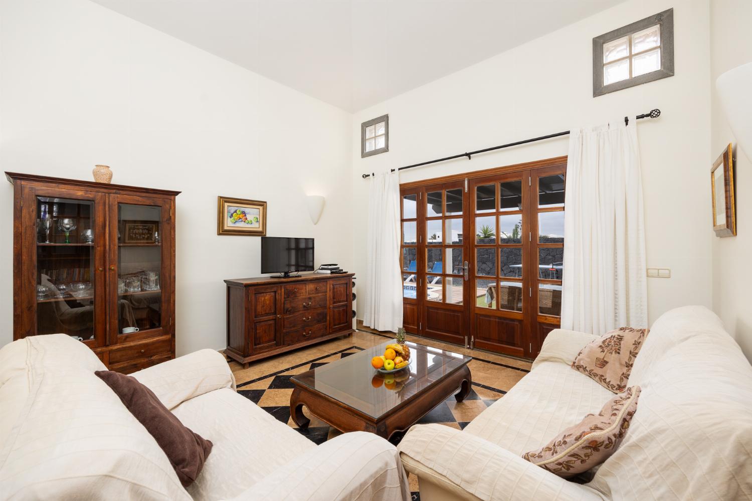 Living room with sofas, WiFi internet, and satellite TV